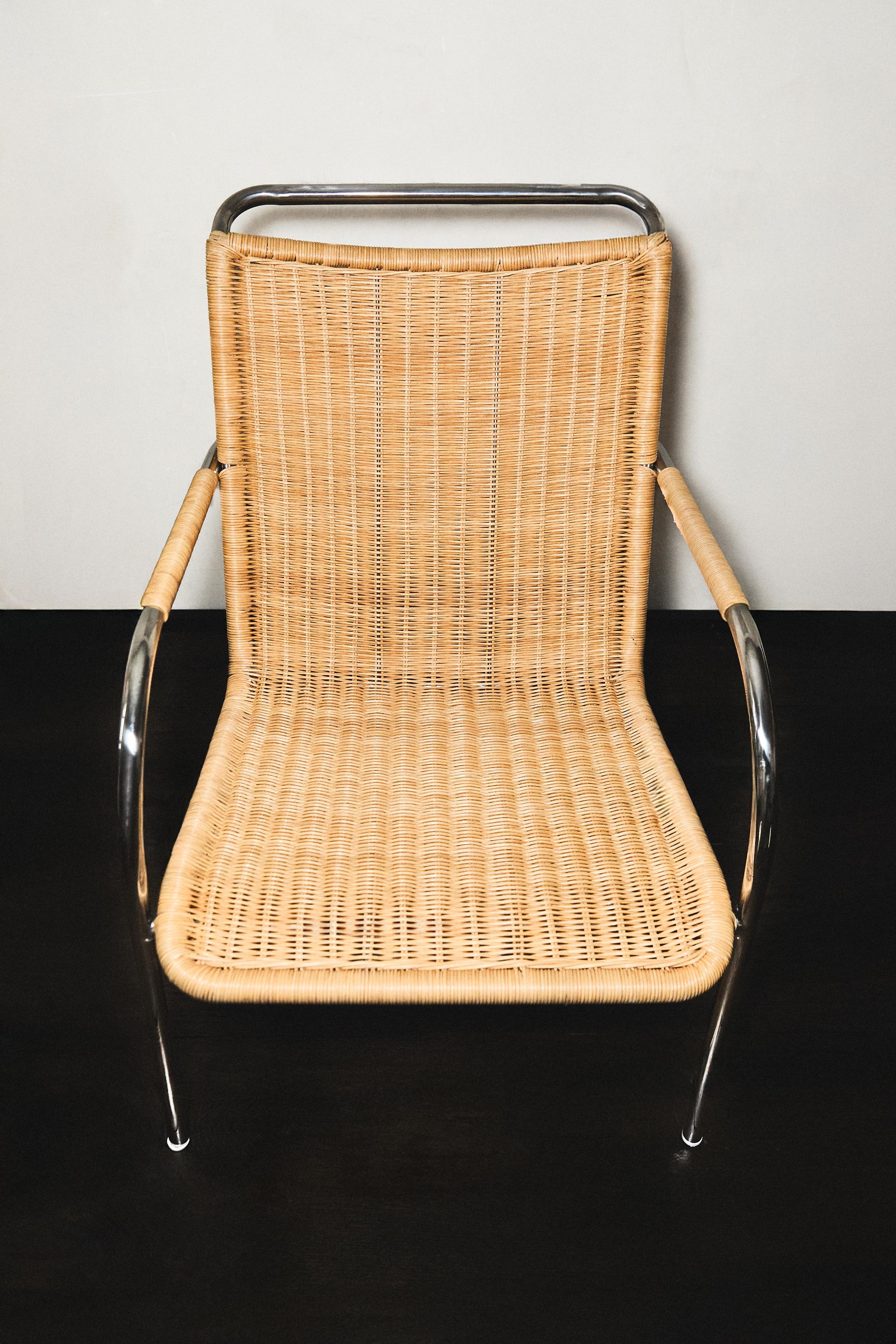 RATTAN AND STEEL ACCENT CHAIR